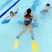 Buhr Park Shark swimmers participate in a swimathon to raise funds for Ann Arbor Active Against ALS and Bob Schoeni at the Buhr Park Pool on Wednesday morning. Melanie Maxwell | AnnArbor.com